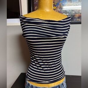 New top . Medium but fits like a small